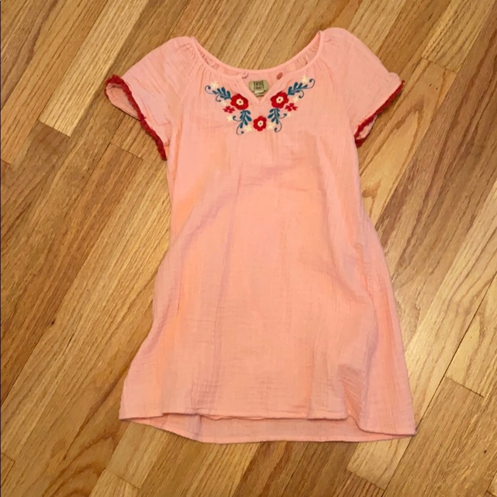 Peach dress with floral detail